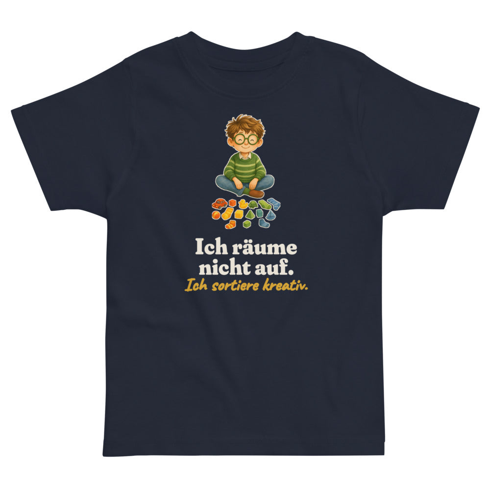Ich räume nicht auf. Ich sortiere kreativ. — Kleinkind-Shirt – Nachtblau