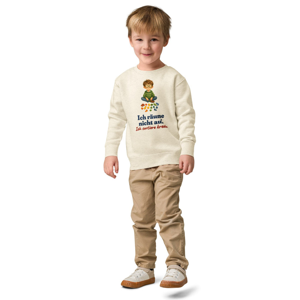 Ich räume nicht auf. Ich sortiere kreativ. — Kinder-Sweatshirt – Produktfoto