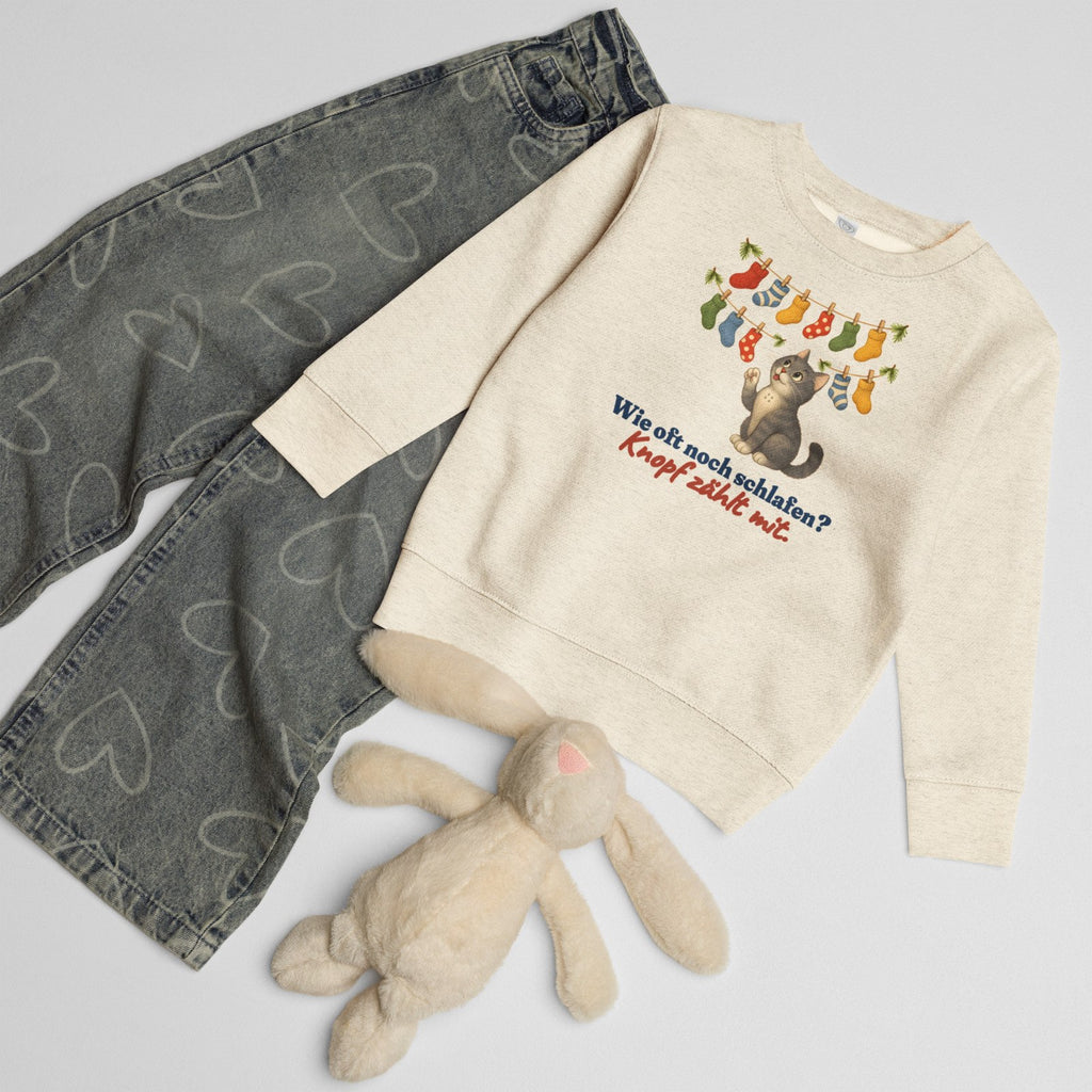 Wie oft noch schlafen? Knopf zählt mit. — Kinder-Sweatshirt – Produktfoto