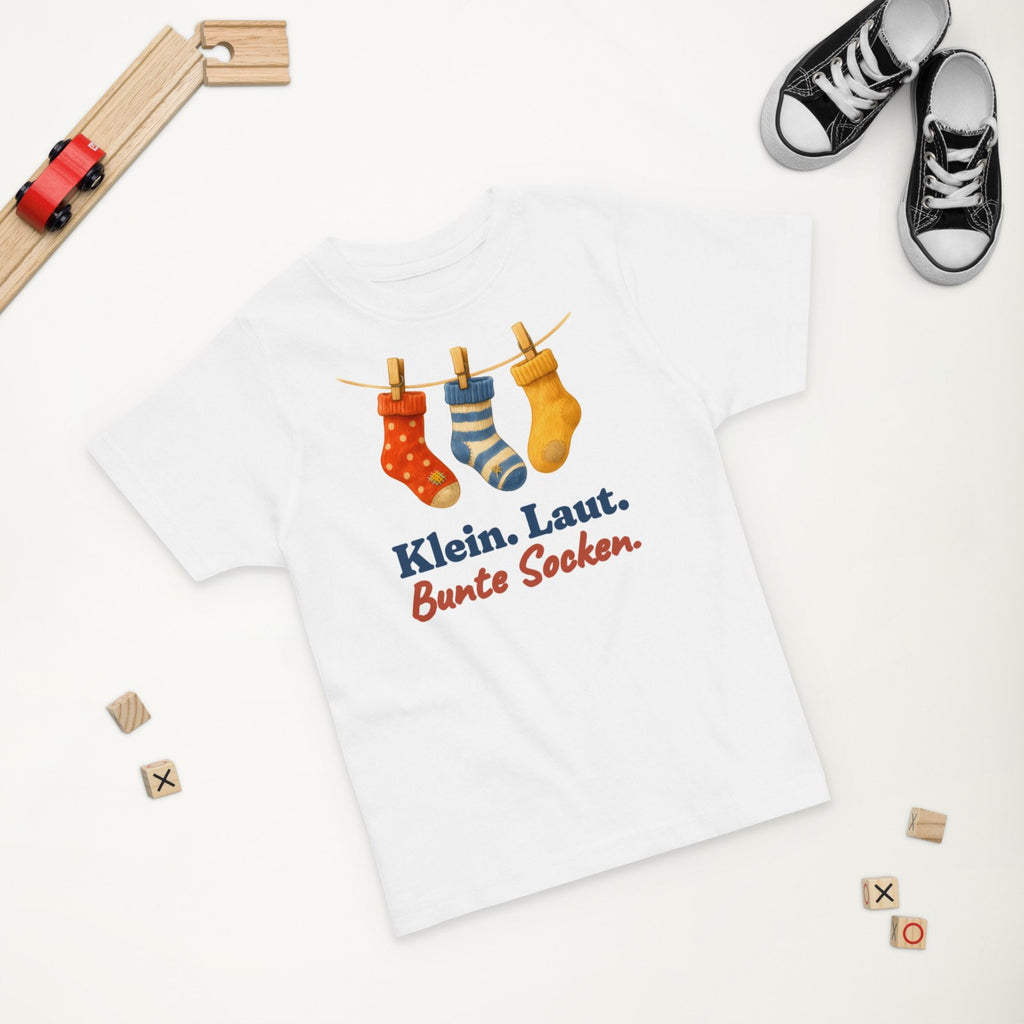 Klein. Laut. Bunte Socken. — Kleinkind-Shirt – Produktfoto